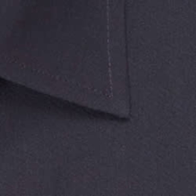 A close-up of a dark navy button-up shirt, showcasing the collar and stitching detail. It includes a subtle logo.