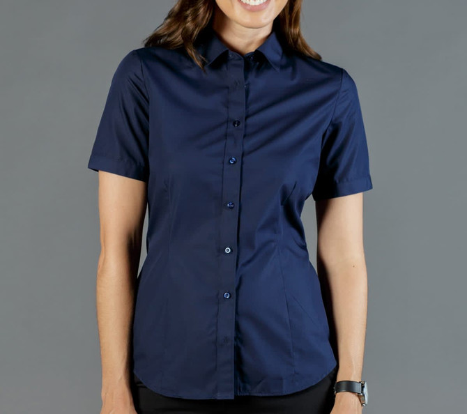 A women's short-sleeve button-up shirt in navy blue, featuring a fitted design and a collar, with a logo.