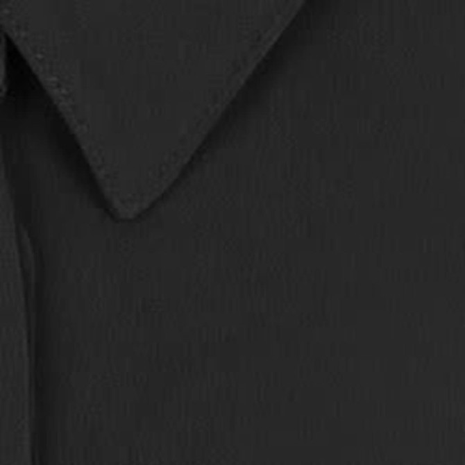 A black half-placket shirt featuring a collared neckline and textured fabric. It includes branding.
