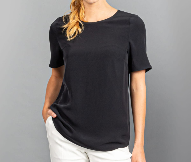 A black short sleeve shirt with a relaxed fit and a crew neckline, featuring a logo.