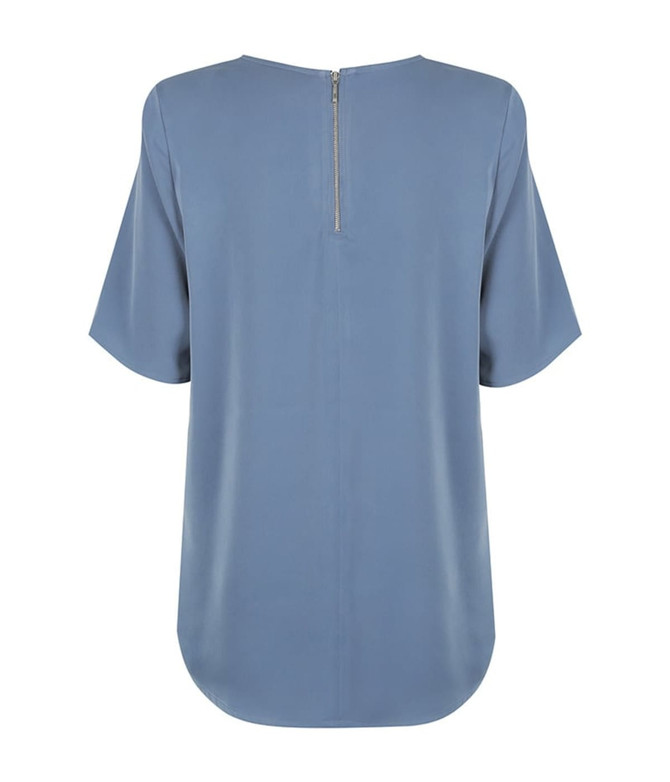 A blue short sleeve shirt with a back zipper, featuring a loose fit and rounded hem. It has a simple design with no visible branding.