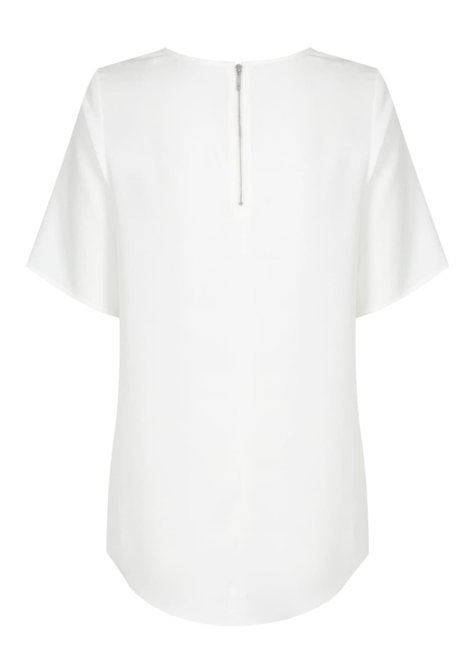 A white short sleeve shirt featuring a back zipper and a smooth finish. The shirt has a simple design with no visible logos.
