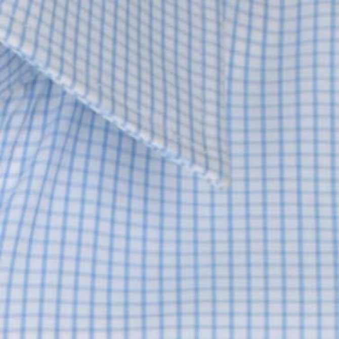 A close-up of a light blue button-up shirt featuring a check pattern with darker blue lines.
