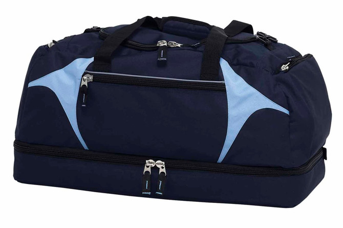 A navy blue duffle bag with light blue accents and multiple zippered compartments. Features a logo.