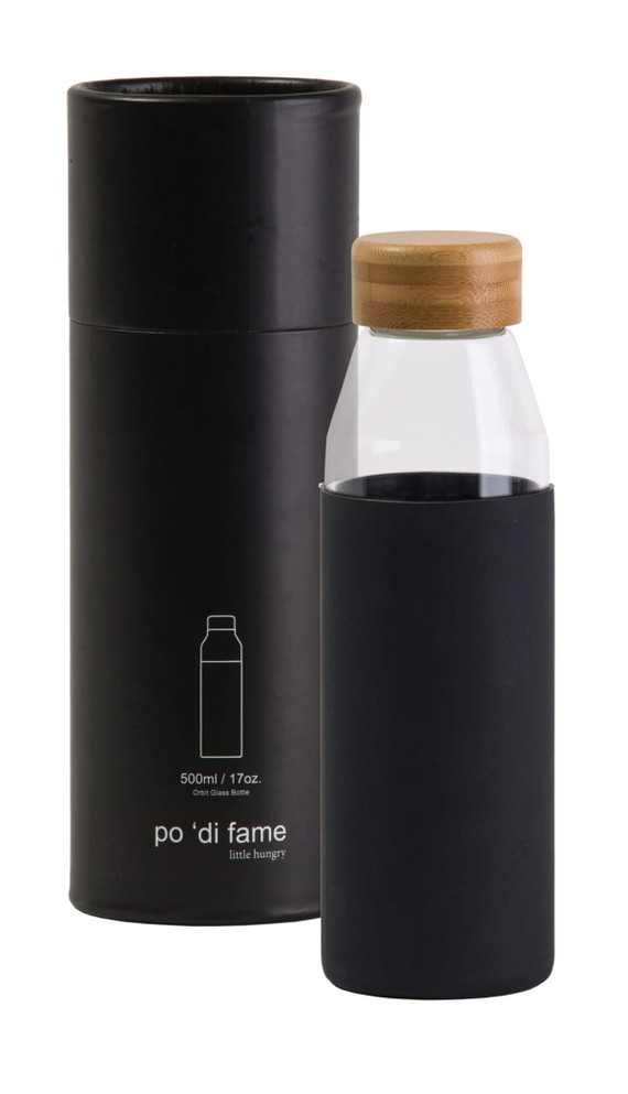 A drink bottle with a clear body, black silicone sleeve, and bamboo lid, presented in a cylindrical black container.