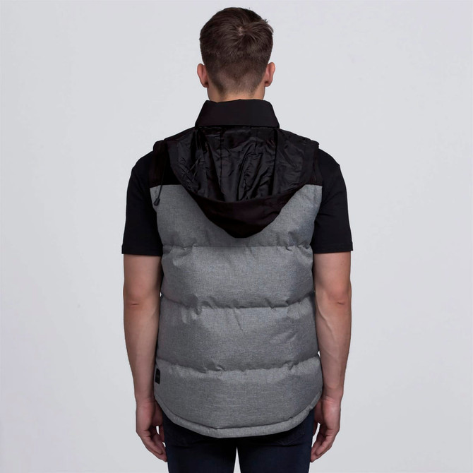 A padded puffa vest in grey with a black hood, featuring a logo on the side.