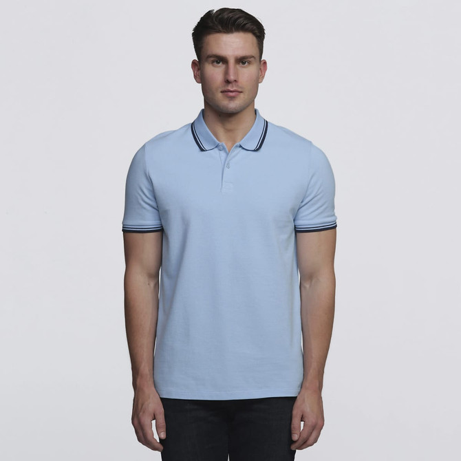 A light blue polo shirt featuring a collar with contrasting stripes and short sleeves, complete with a logo.