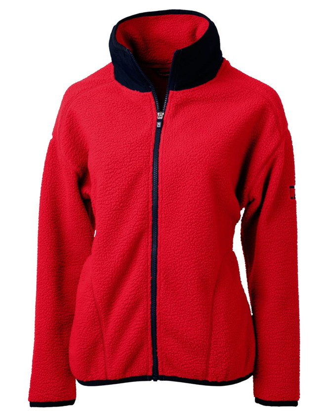 A red eco sherpa jacket with a navy collar and zip closure, featuring a logo on the sleeve. A red eco sherpa jacket with a navy collar and zip closure, featuring a logo on the sleeve.