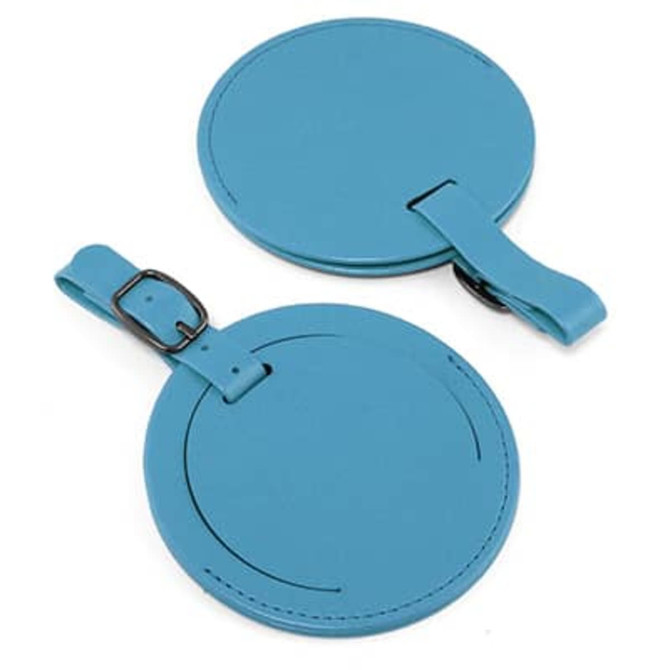 A round concealed luggage tag in a vibrant blue colour with a matching strap and buckle for attachment.