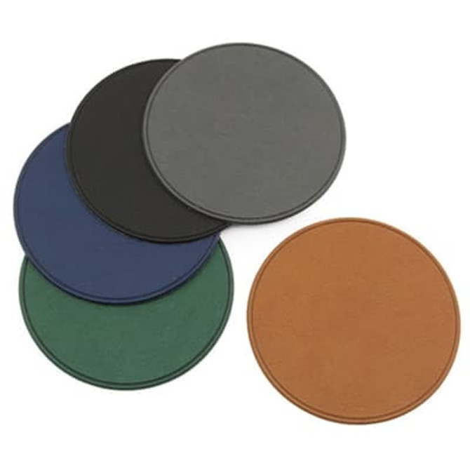 A set of biodegradable round coasters in green, blue, black, grey, and brown, stacked together.