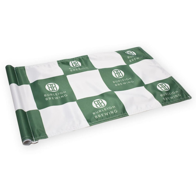 A golf flag featuring a green and white checkered pattern, with a logo on the fabric.