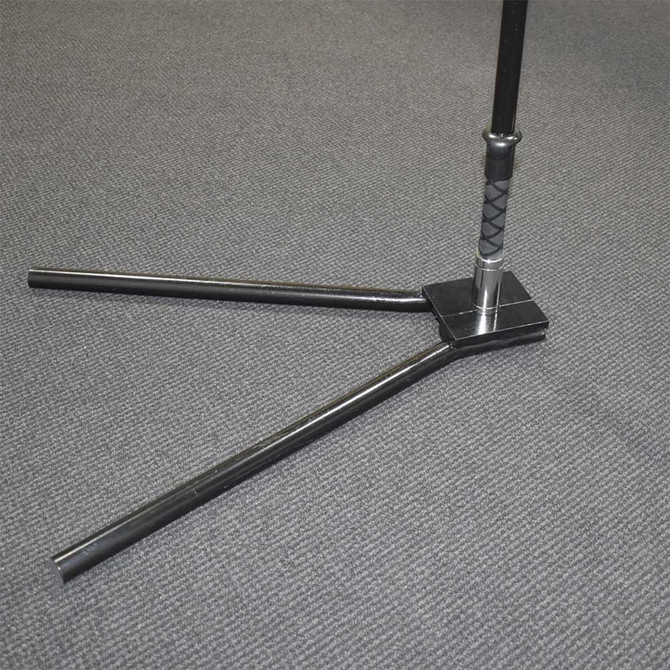 A black flagpole base with three legs, designed for stability, featuring a central holder.