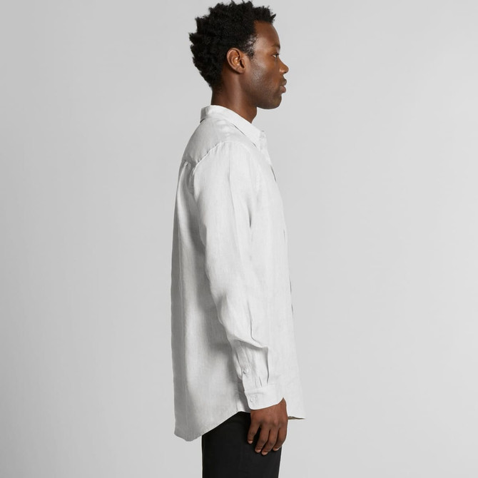 A linen button-up shirt in light grey, featuring a side view of a model wearing it. The shirt has a logo.