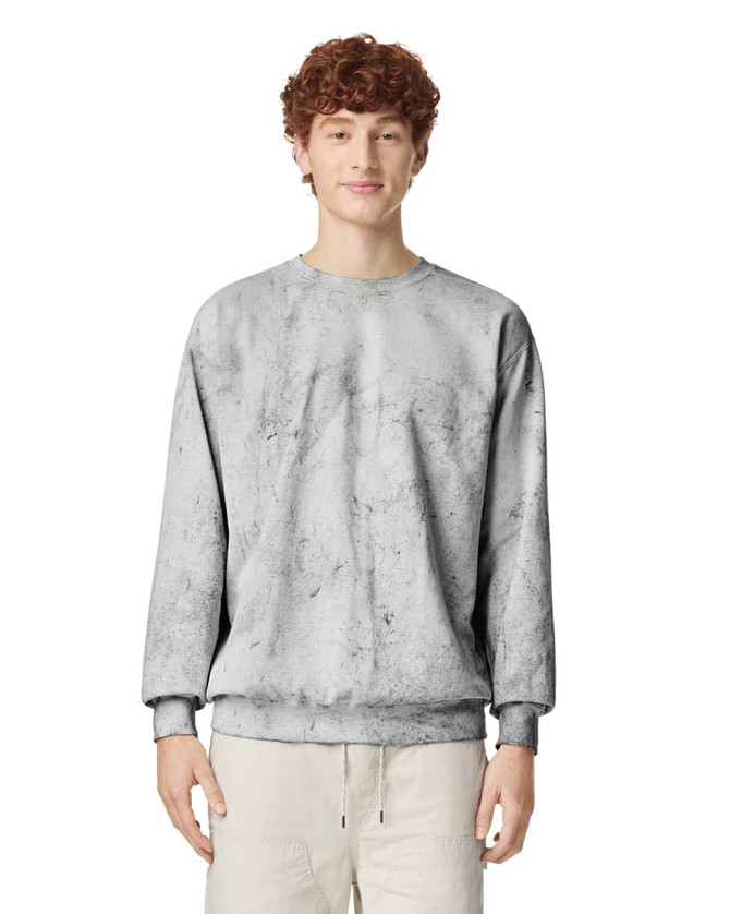 A grey crewneck sweatshirt with a textured design, featuring long sleeves and a relaxed fit. It has a logo.