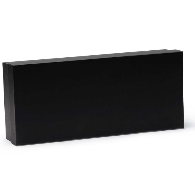 A black rectangular block made of solid material, featuring a smooth surface and sharp edges.