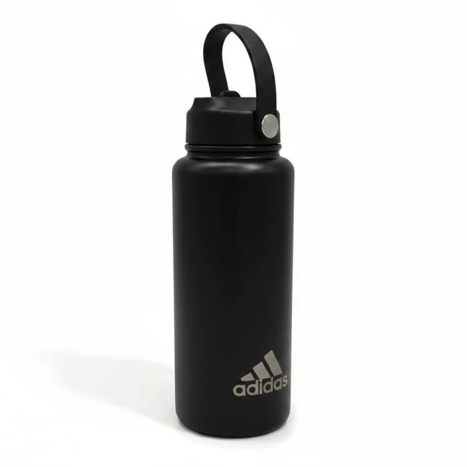 A drink bottle in matte black with a carry handle and a logo on the front.