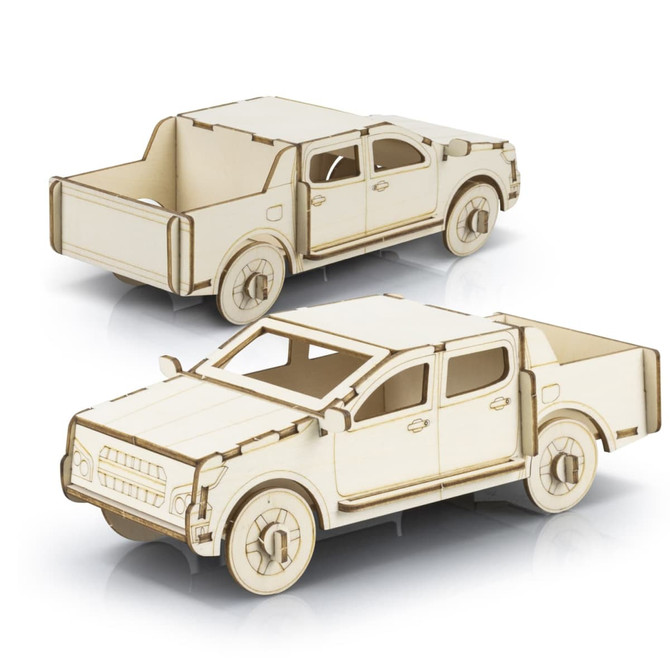 A wooden model of a UTE in a natural finish, featuring detailed cutouts and an assembled design.