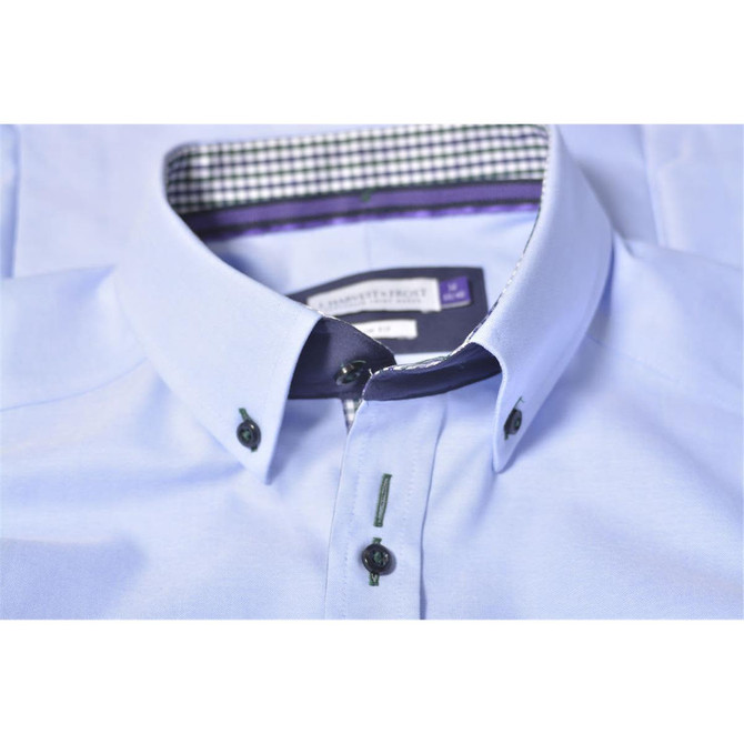 A purple button-up men's shirt featuring a checkered pattern inside the collar and black buttons.