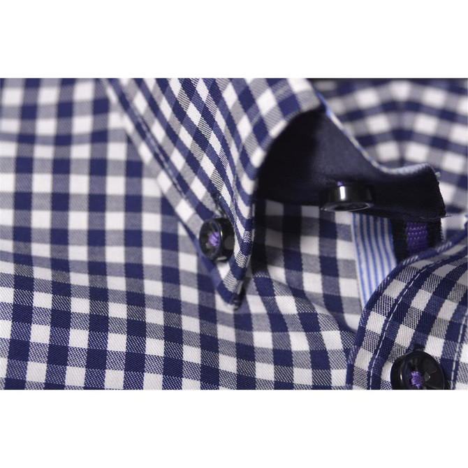 A close-up of a purple and white checkered button-up shirt featuring a collar and button detail.