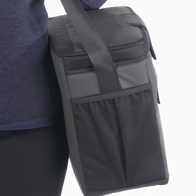 A cooler bag in black, featuring a shoulder strap and a mesh pocket on the side, with branding.