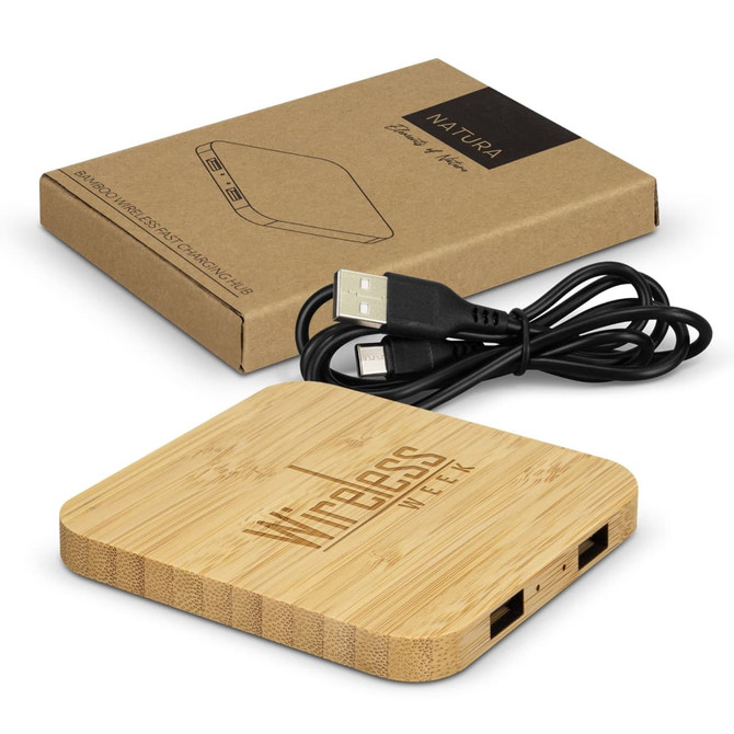 A bamboo wireless charging hub with two USB ports, accompanied by a brown cardboard packaging and a USB cable.
