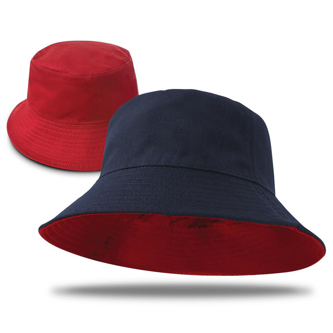 A reversible bucket hat featuring red on one side and navy blue on the other, with a branded logo.