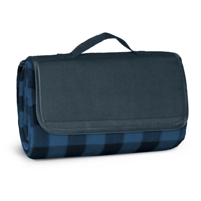 A folded picnic blanket in dark blue and navy check pattern, secured with a handle. It features a logo on the side.