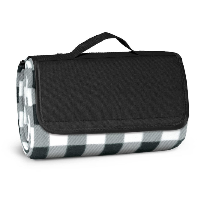 A folded picnic blanket featuring a green and white checkered pattern, with a black carrying handle.