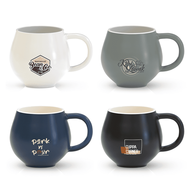 A coffee mug collection featuring white, grey, navy, and black designs, each with unique branding.