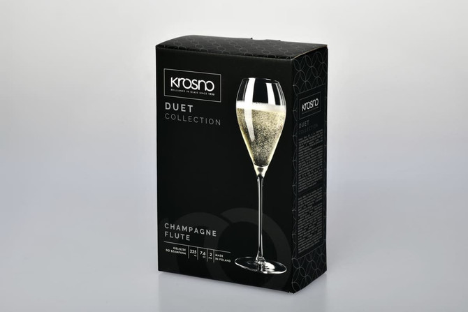 A gift box containing two Krosno Duet champagne flutes, featuring a sleek design in clear glass.