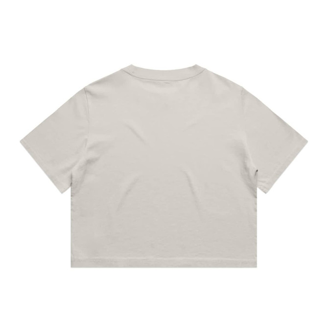 A heavy faded crop tee in a neutral beige colour, featuring short sleeves and a relaxed fit. The garment has a logo.