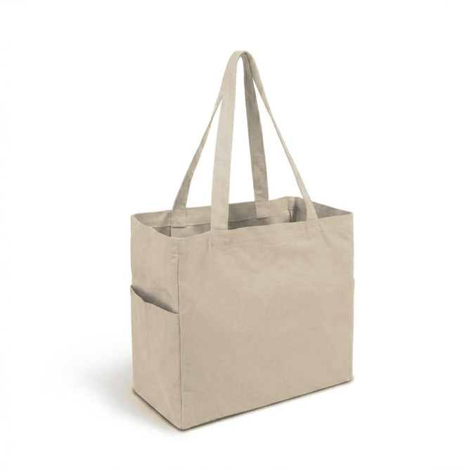A natural beige canvas tote bag with long handles and a side pocket. Features a logo.