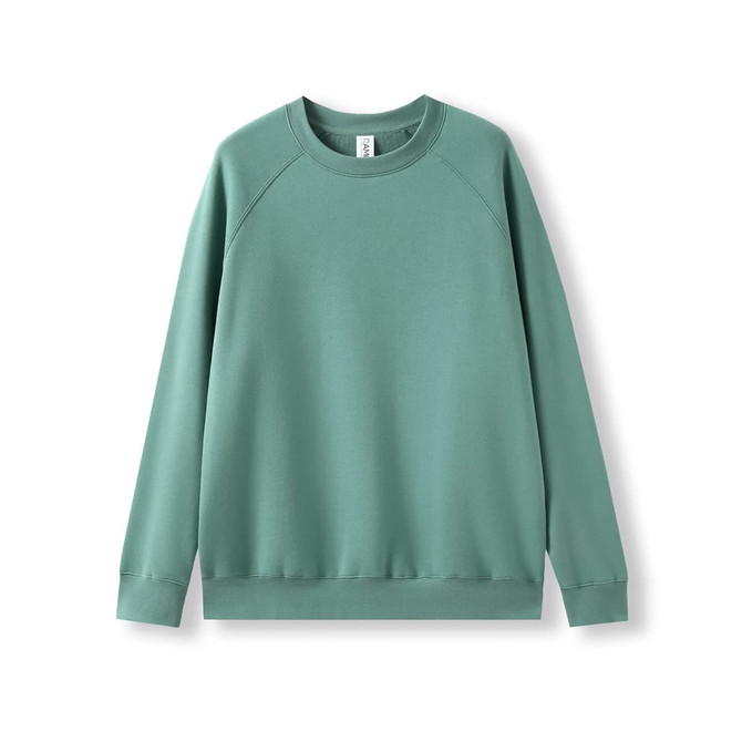 A green cotton sweatshirt with a crew neck and long sleeves. It has a logo on the label.