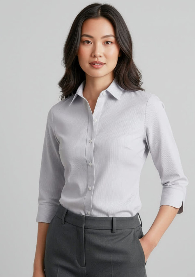 A light grey women's button-up shirt with 3/4 sleeves, featuring a collar and a front button closure.