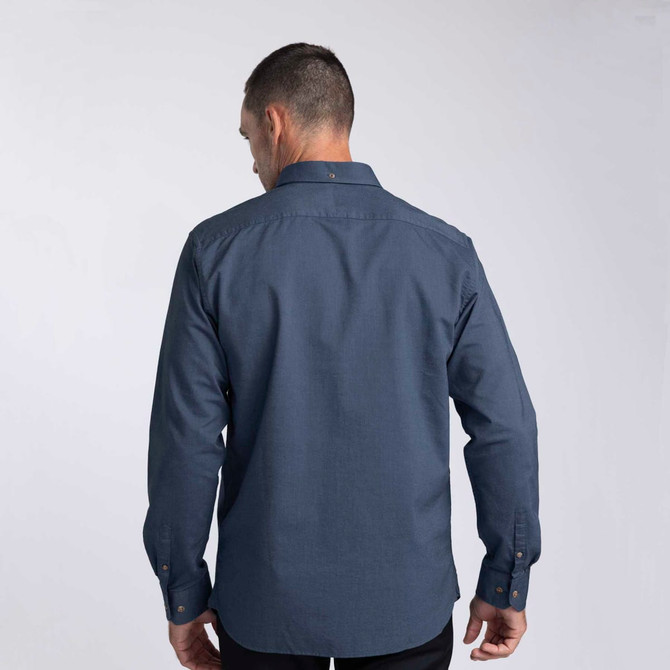 A back view of a men's button-up shirt in navy blue, featuring a collar and long sleeves. The shirt has a logo.