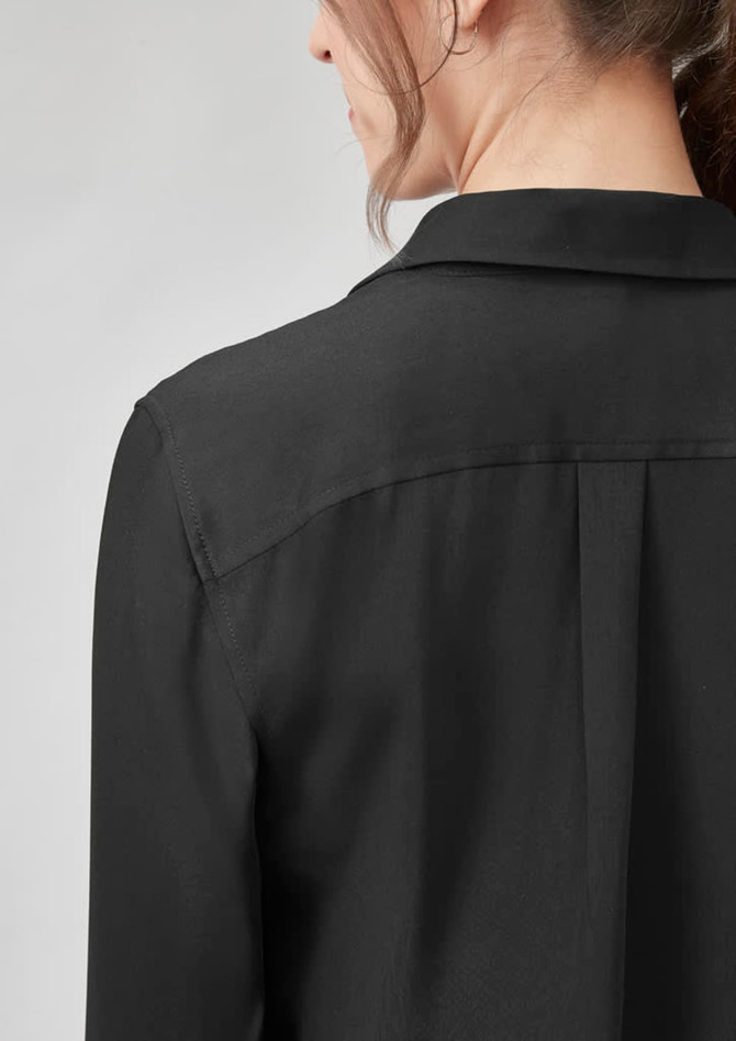 A black long sleeve women's shirt featuring a collar and a back yoke design. A black long sleeve women's shirt featuring a collar and a back yoke design.