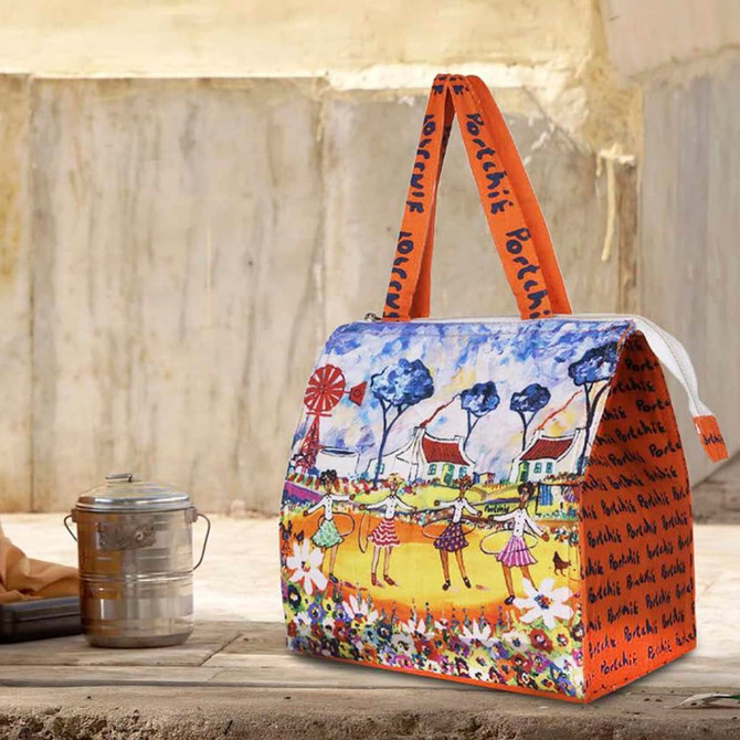 A vibrant cooler bag featuring a colourful design with trees and children, complemented by orange handles and a logo.