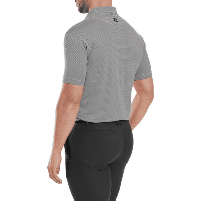 A men's short-sleeve polo shirt in light grey, featuring a logo on the back and paired with black trousers.