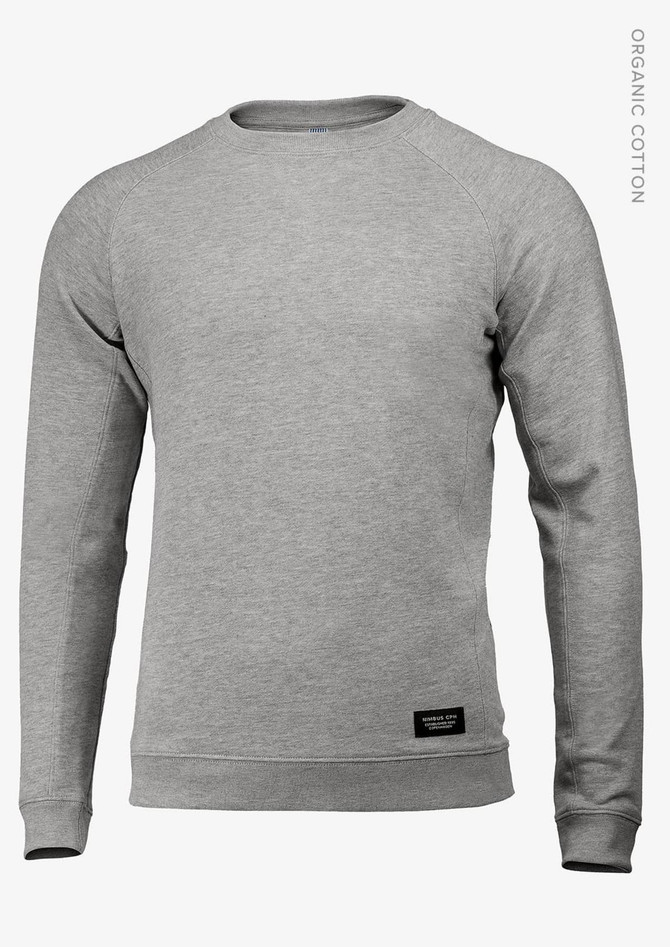 A grey sweatshirt featuring long sleeves and a crew neck, with a small logo on the lower section.