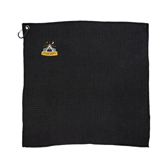 A black travel towel with a textured surface and a logo featuring a camping motif.