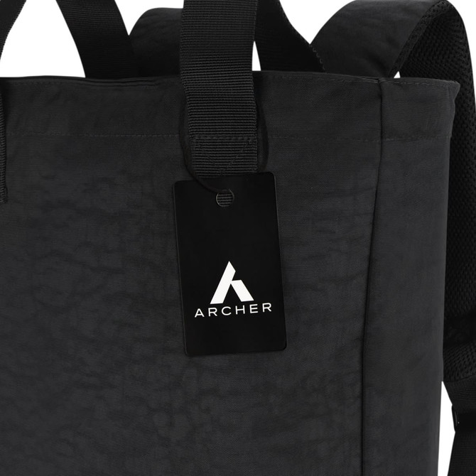 A black totepack featuring adjustable straps and a branded tag showcasing the logo.