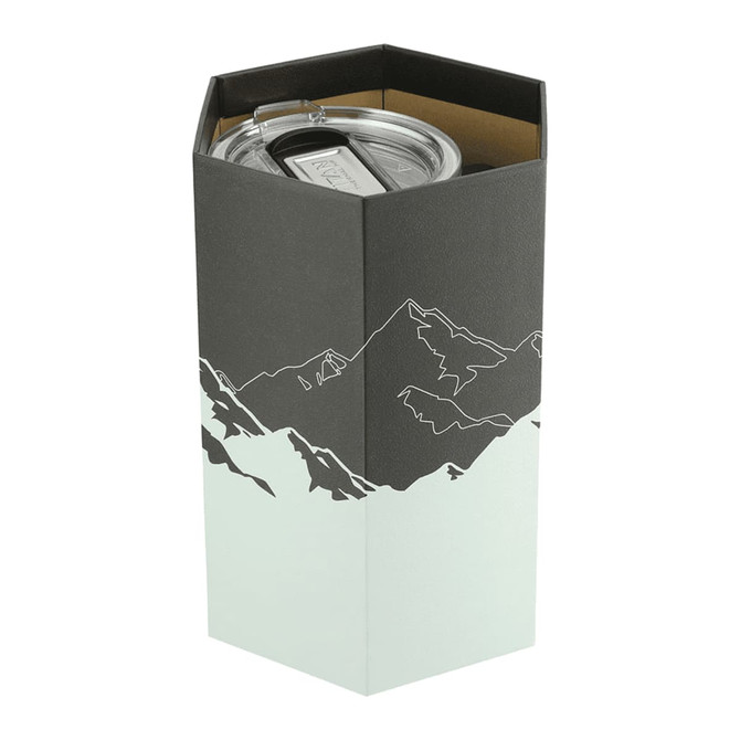 A drink bottle in a hexagonal box featuring a mountain design, showcasing a clear lid and stainless steel body.