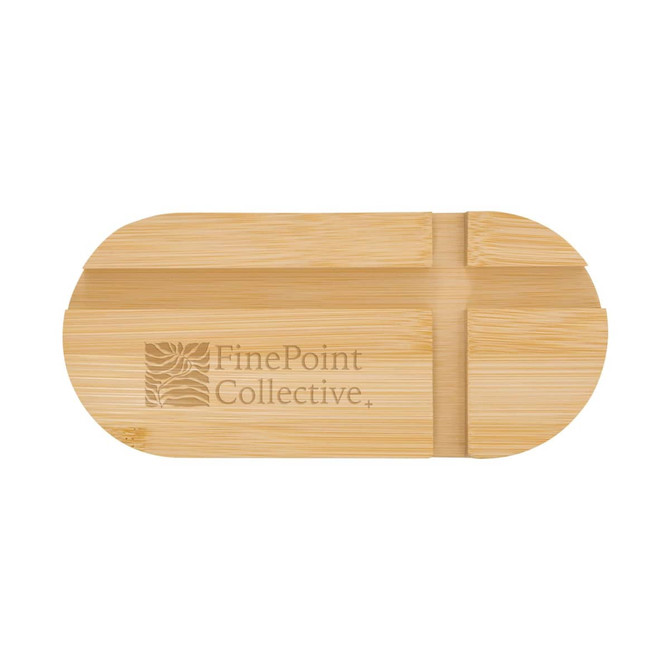A bamboo phone stand with an oval shape and a logo. It features slits for device placement.