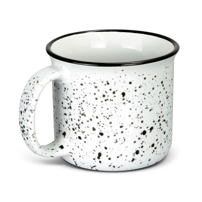A ceramic mug in white with a speckled black pattern and a black rim, featuring a handle and a logo.