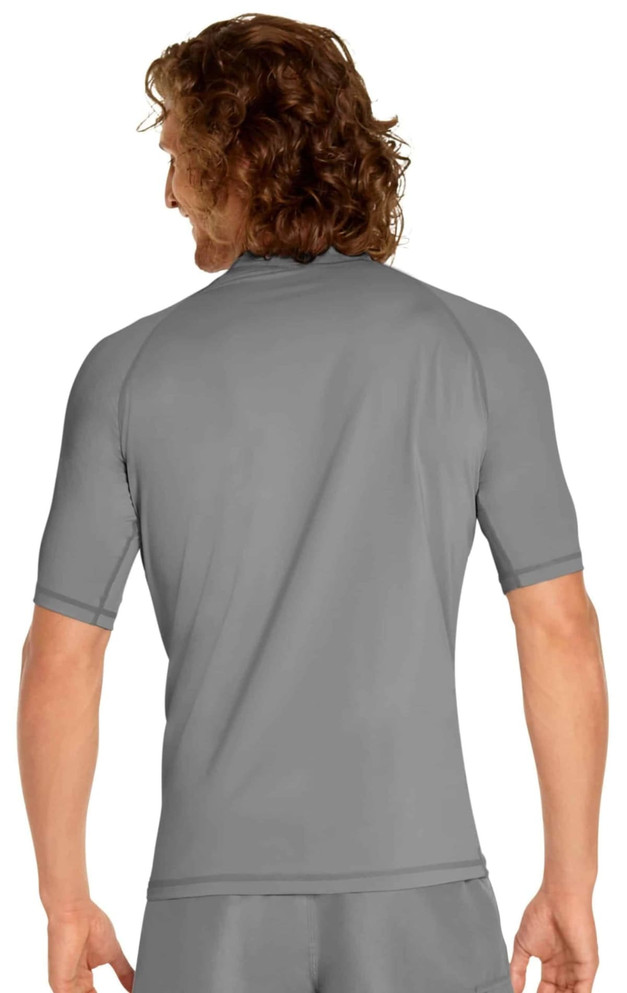 A grey short sleeve rashie with a fitted design, featuring a logo on the back.