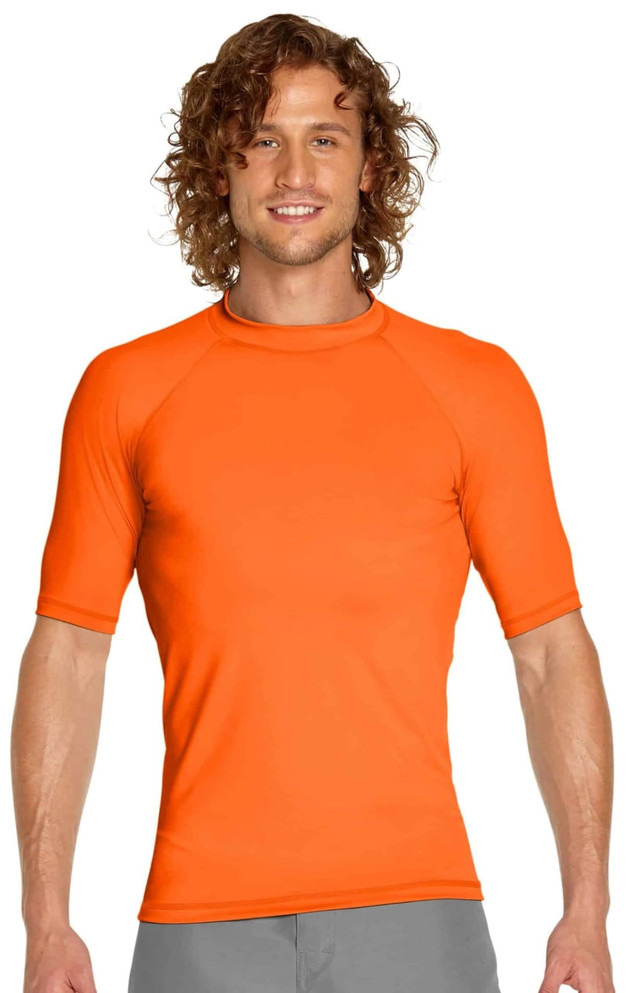 An orange adult short sleeve rashie with a fitted design and a logo on the chest.