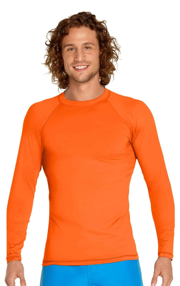 An orange long sleeve rashie with a snug fit, featuring a logo on the chest. Suitable for sun protection with UPF 50+.