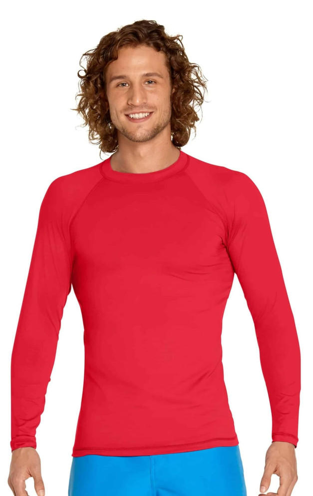 A red long sleeve rashie for adults with a fitted design and a logo on the sleeve. UPF 50+ protection featured.