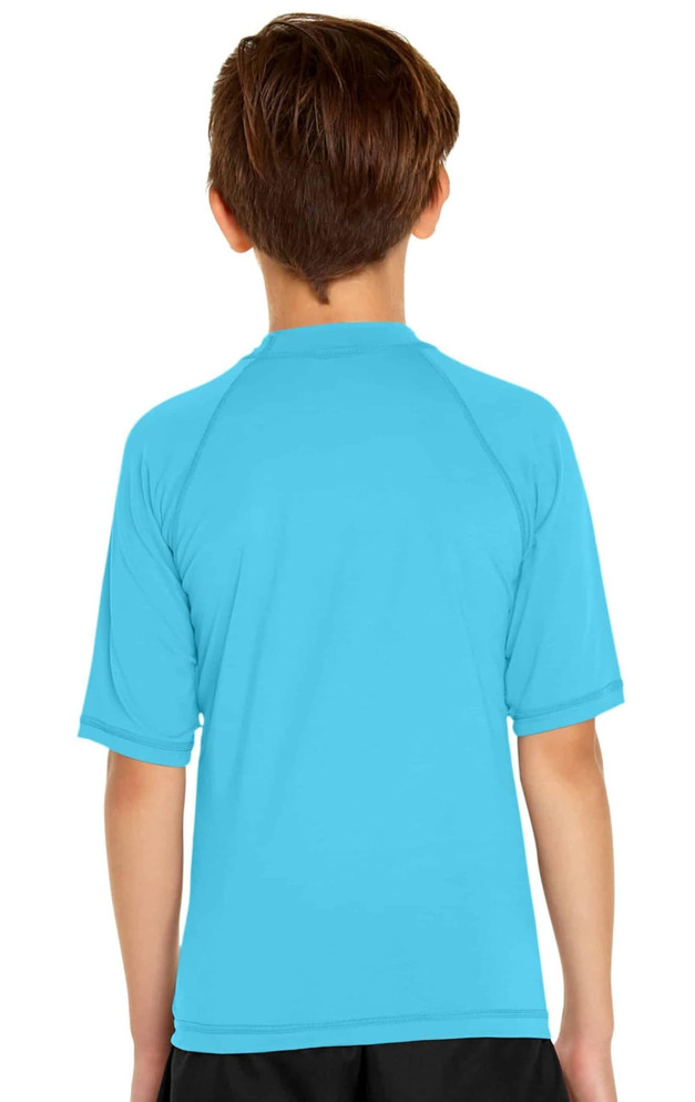 A youth short sleeve rashie in bright blue, featuring a simple design and a logo on the back.
