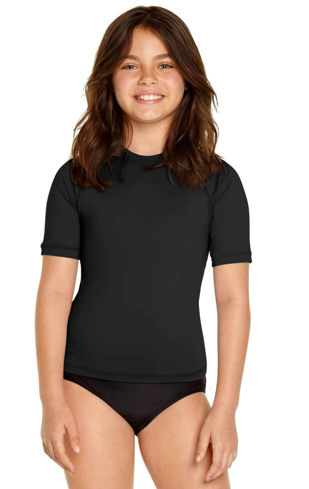 A black youth short sleeve rashie, offering UPF 50+ protection, made from stretchy material. It features a logo.